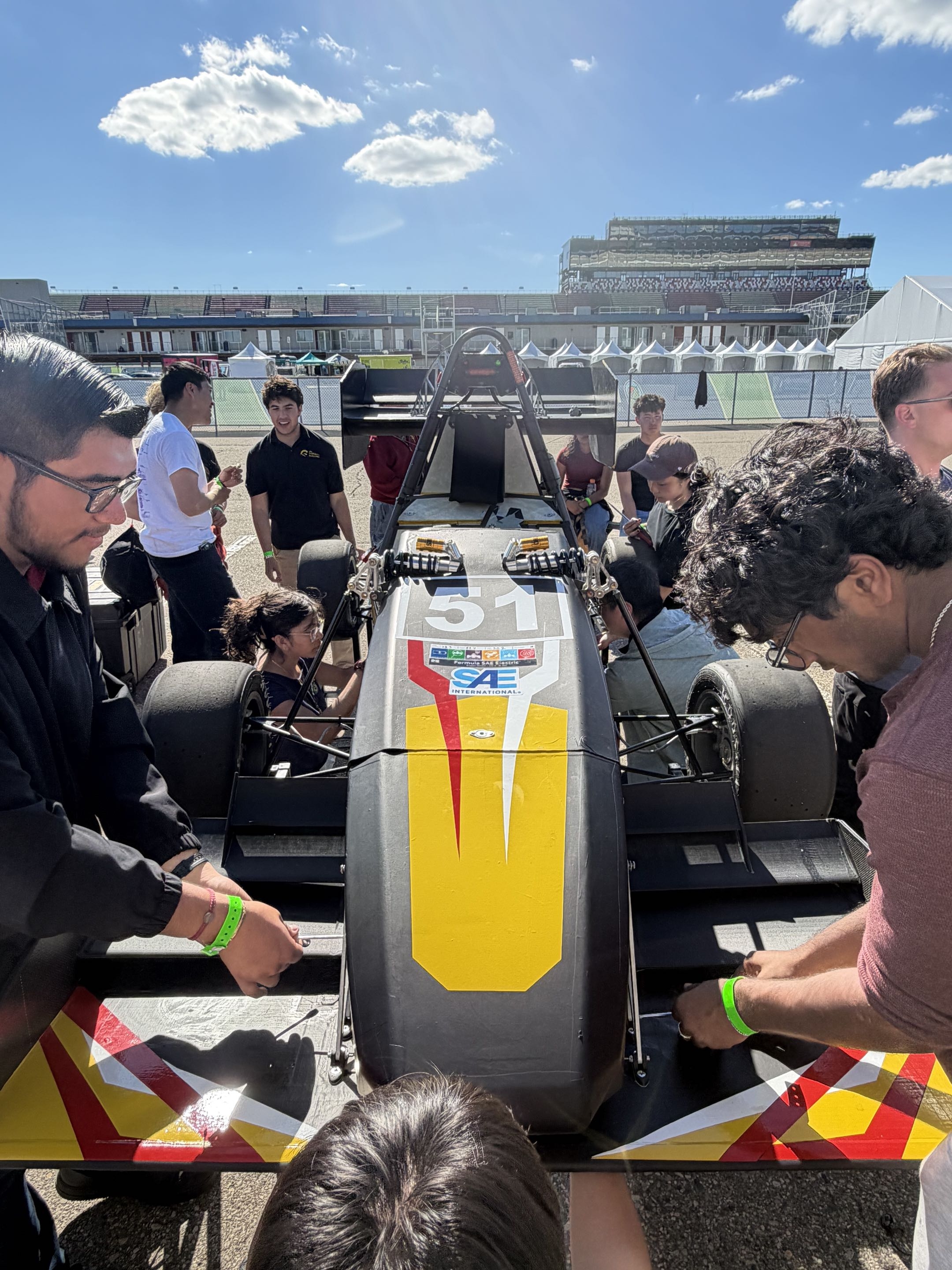 Front wing assembly and tech inspection verification at competition